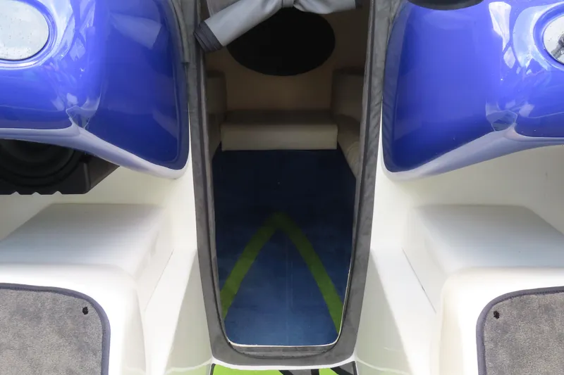 Slide: The Image of 2007 Outerlimits 44 GTX interior with blue accents and seating area. - 16