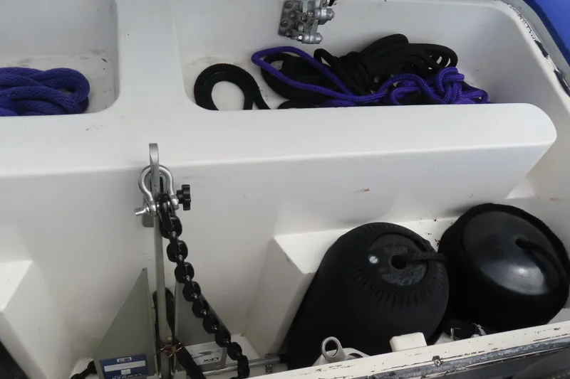 Slide: The Image of Storage compartment of 2007 Outerlimits 44 GTX with ropes and fenders. - 22