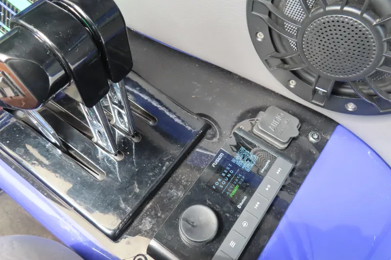 Slide: The Image of 2007 Outerlimits 44 GTX boat controls and audio system close-up. - 27