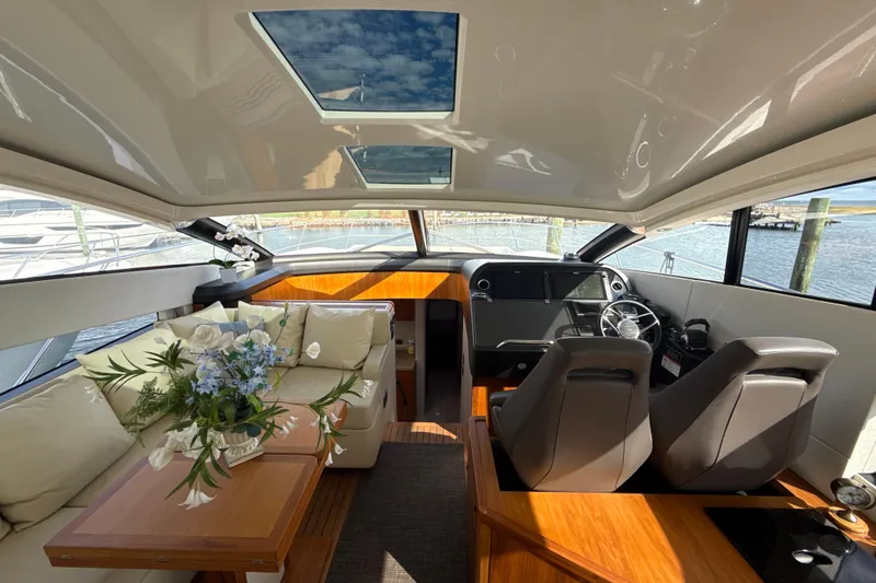 Slide: The Image of Luxurious interior of 2016 Sunseeker Predator 57 yacht with elegant seating and modern helm. - 29