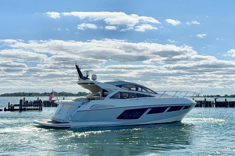 Slide: The Image of 2016 Sunseeker Predator 57 yacht cruising on a sunny day with blue skies. - 3