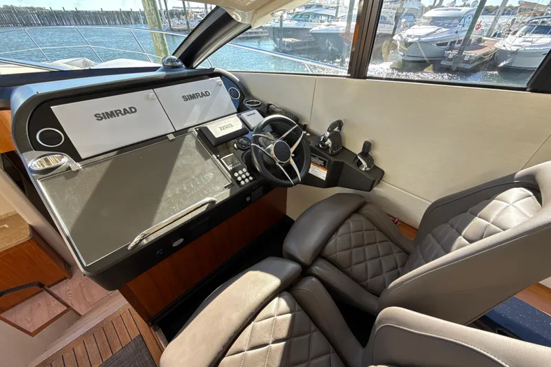 Slide: The Image of Helm of 2016 Sunseeker Predator 57 yacht with Simrad navigation system and leather seats. - 39