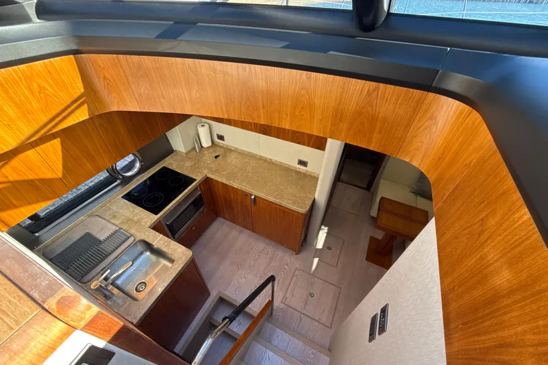 Slide: The Image of Luxurious interior of 2016 Sunseeker Predator 57 yacht with modern kitchen design. - 45