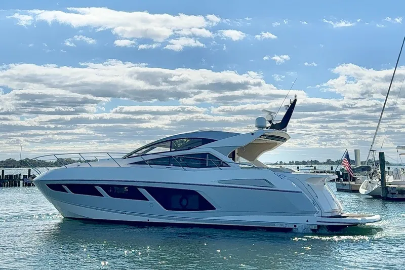 Slide: The Image of Luxury Sunseeker Predator 57 yacht, 2016 model, cruising on a sunny day. - 5