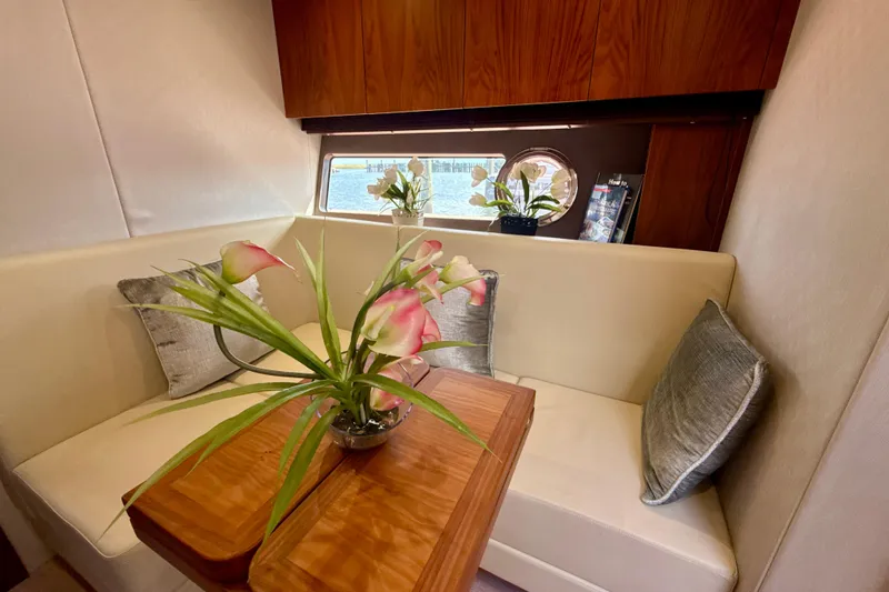 Slide: The Image of Luxurious interior of 2016 Sunseeker Predator 57 yacht with elegant seating and floral decor. - 50