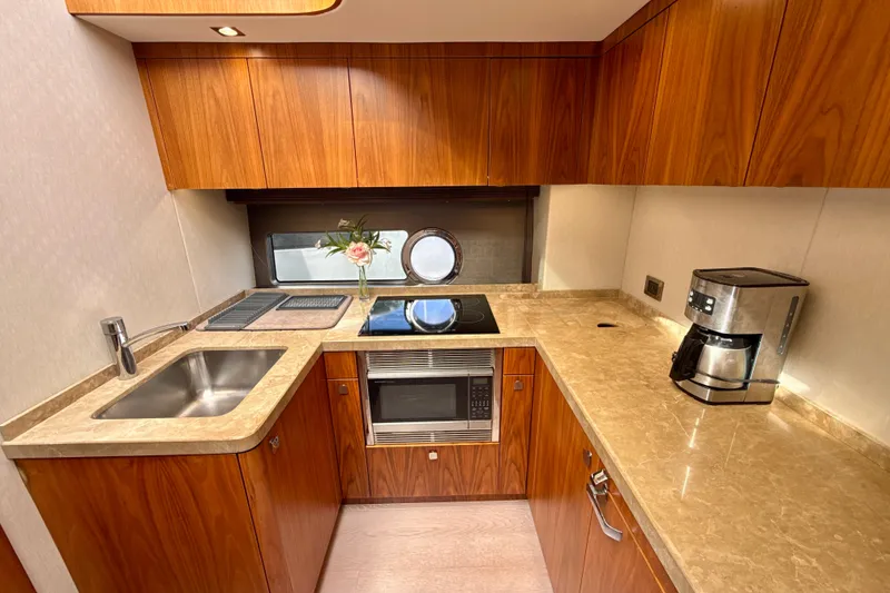 Slide: The Image of Luxurious kitchen interior of 2016 Sunseeker Predator 57 yacht with modern appliances. - 53