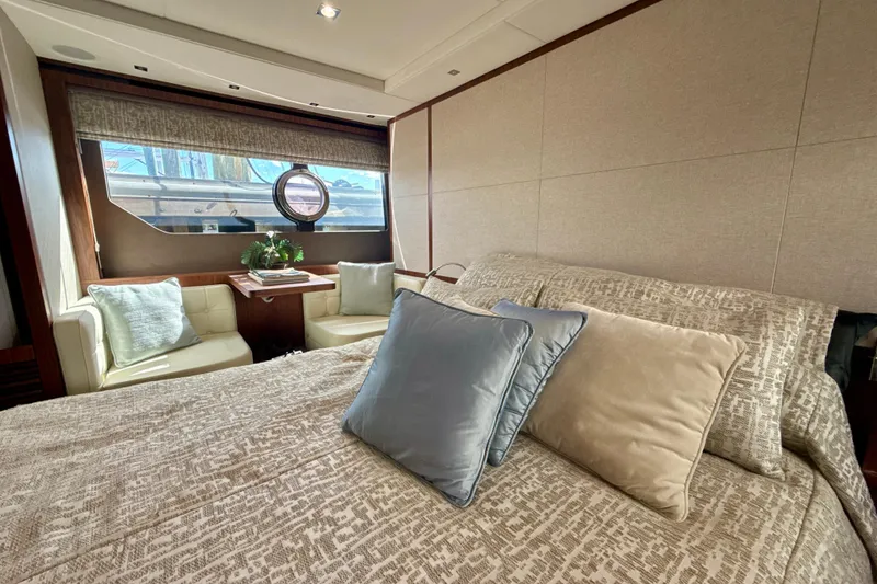 Slide: The Image of Luxurious interior of 2016 Sunseeker Predator 57 yacht with elegant bedding and seating. - 57