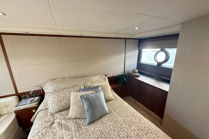 Slide: The Image of Luxurious bedroom interior of 2016 Sunseeker Predator 57 yacht with elegant decor. - 58