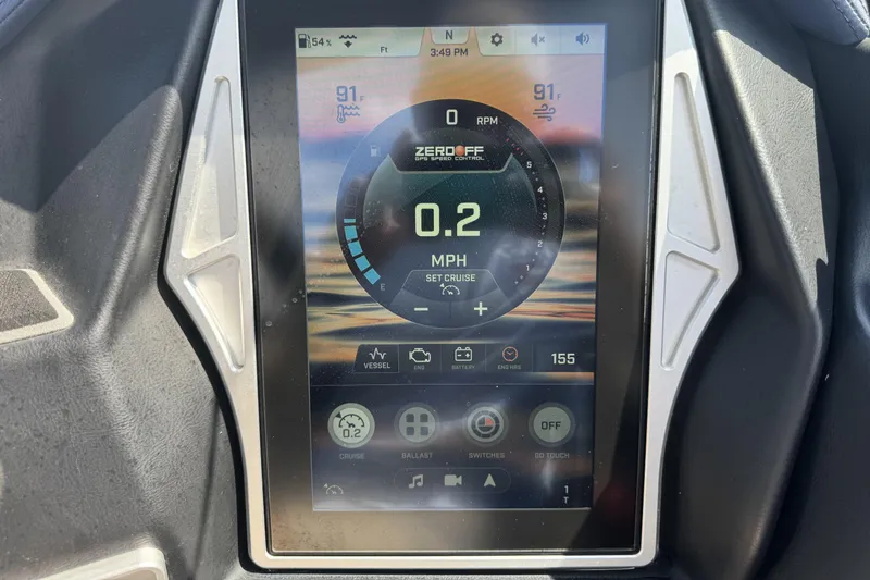 Slide: The Image of Touchscreen display of a 2020 Tigé 22RZX boat showing speed and control settings. - 12