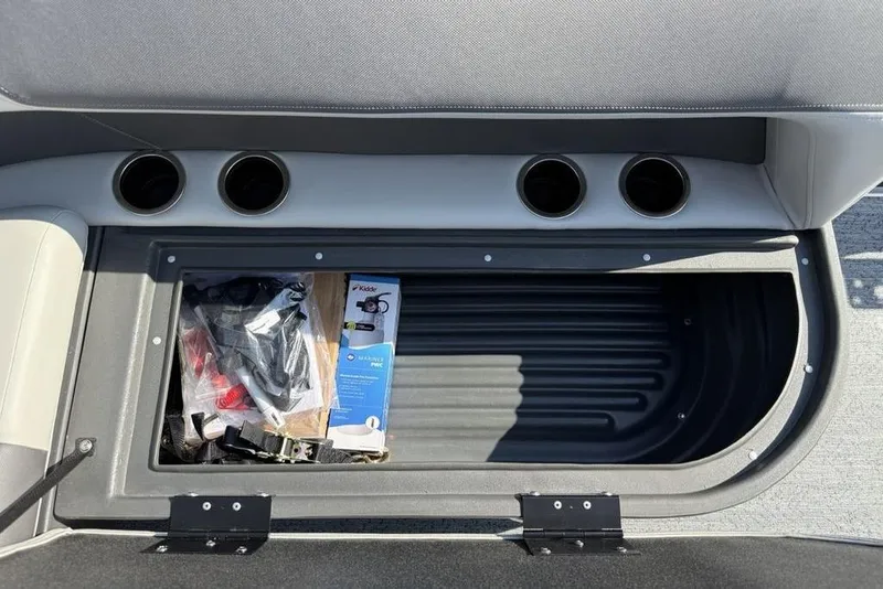 Slide: The Image of Storage compartment in 2026 Sun Tracker Bass Buggy 16 XL Select boat. - 11