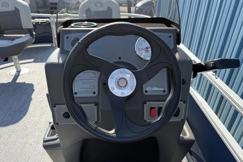 Slide: The Image of Steering console of 2026 Sun Tracker Bass Buggy 16 XL Select pontoon boat. - 6