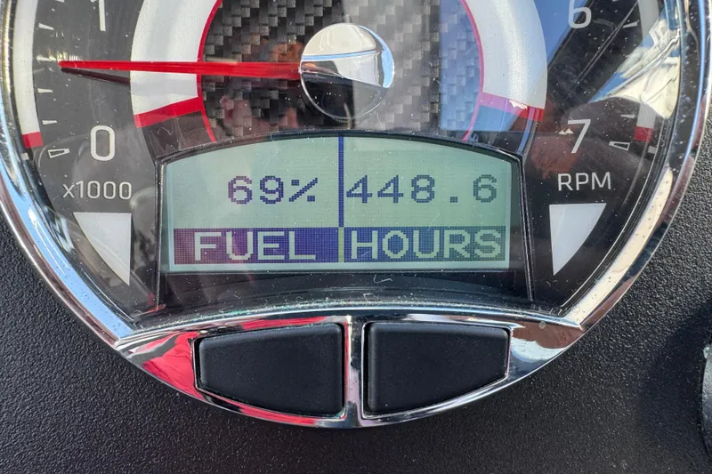 Slide: The Image of 2020 Four Winns Vista 275 dashboard showing fuel level and engine hours. - 20
