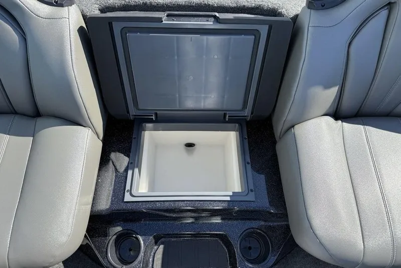 Slide: The Image of Interior of 2026 Skeeter ZXR20 SE boat with open storage compartment. - 20