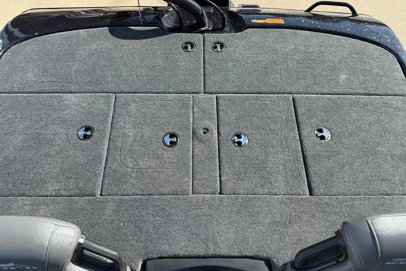 Slide: The Image of 2026 Skeeter ZXR20 SE boat deck with storage compartments and sleek design. - 21