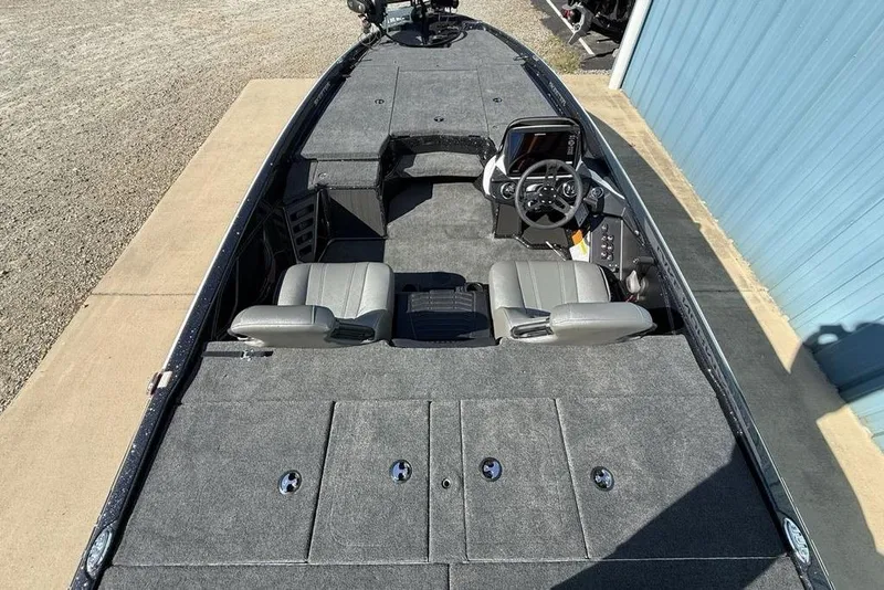 Slide: The Image of 2026 Skeeter ZXR20 SE boat interior with dual seats and steering console. - 28