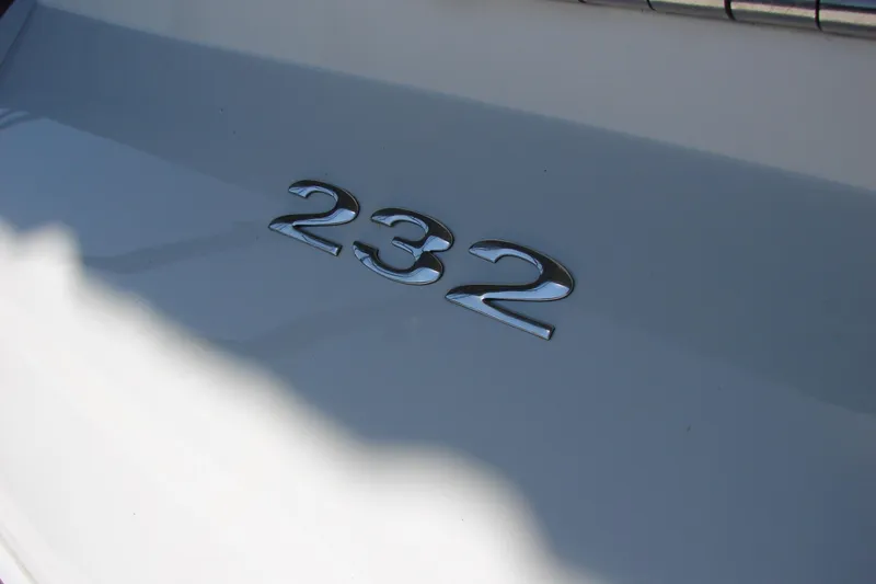 Slide: The Image of Close-up of 2011 Cobalt 232 model emblem on white surface. - 35