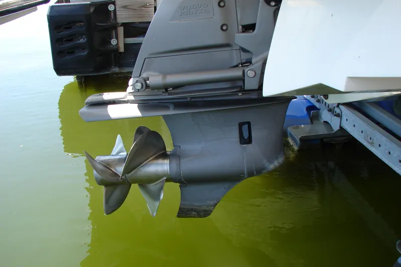 Slide: The Image of 2011 Cobalt 232 boat propeller in water, showcasing Volvo Penta drive system. - 41