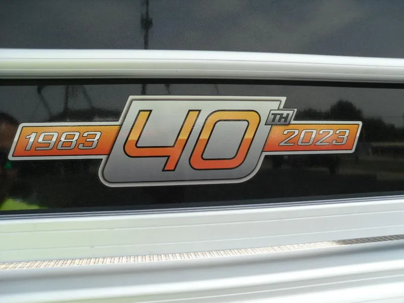 Slide: The Image of Sun Tracker Sportfish™ 24 XP3 40th Anniversary Emblem, 1983-2023. - 12