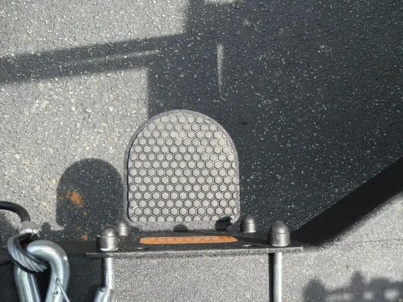 Slide: The Image of Close-up of a textured foot pedal on a 2023 Sun Tracker Sportfish™ 24 XP3 boat. - 14