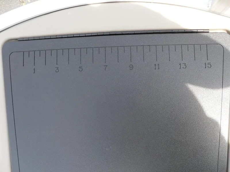 Slide: The Image of Ruler on Sun Tracker Sportfish™ 24 XP3 boat, 2023 model, showing measurements. - 18