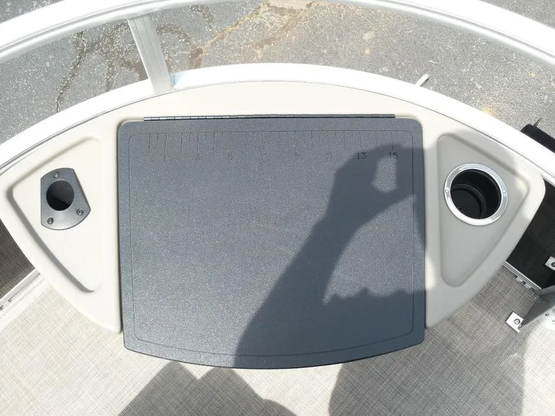 Slide: The Image of 2023 Sun Tracker Sportfish™ 24 XP3 boat deck with cup holders and shadow. - 21