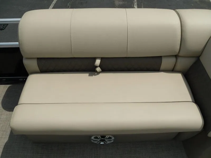 Slide: The Image of 2023 Sun Tracker Sportfish™ 24 XP3 beige boat seating with cushioned backrest. - 26