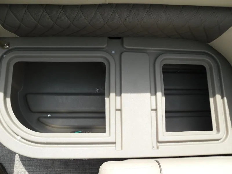 Slide: The Image of 2023 Sun Tracker Sportfish™ 24 XP3 storage compartments, featuring durable design and ample space. - 32