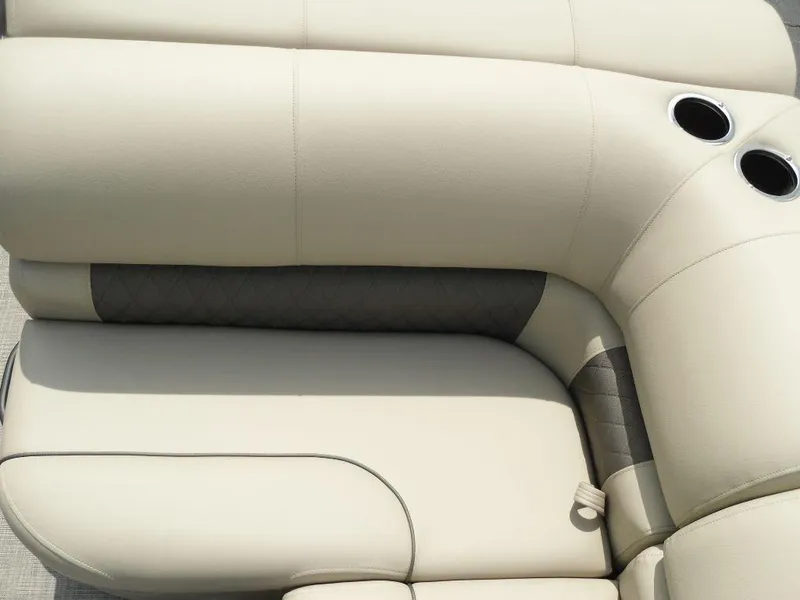 Slide: The Image of 2023 Sun Tracker Sportfish™ 24 XP3 boat seating with cup holders, beige upholstery. - 33