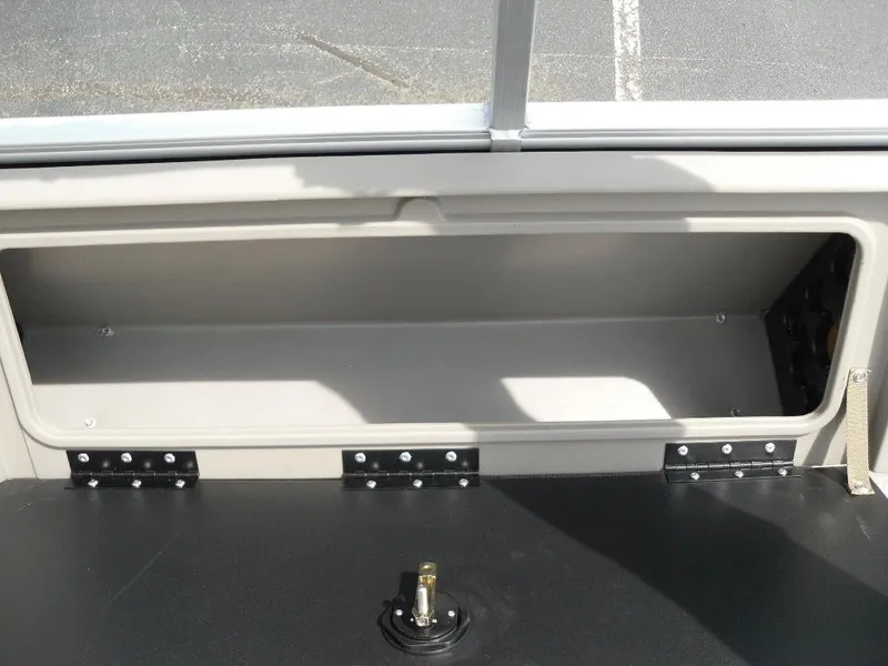 Slide: The Image of Storage compartment of 2023 Sun Tracker Sportfish™ 24 XP3 boat, open and empty. - 34