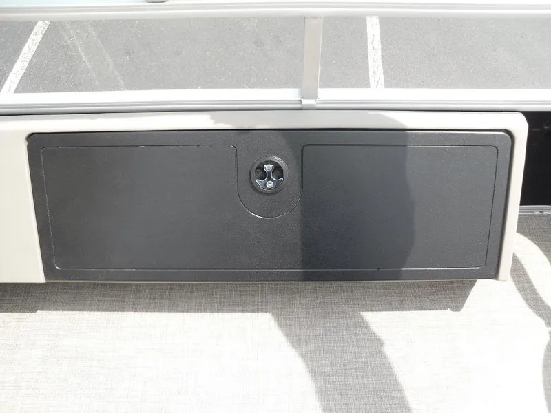 Slide: The Image of 2023 Sun Tracker Sportfish™ 24 XP3 storage compartment with secure latch on deck. - 35