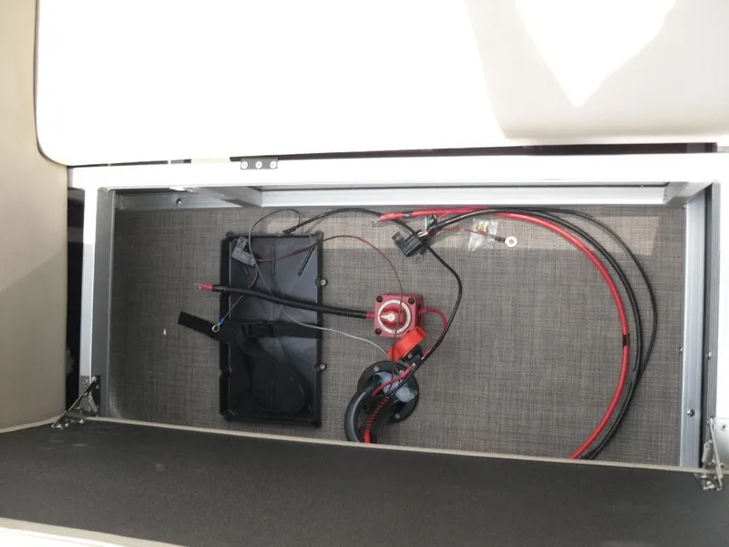 Slide: The Image of Interior wiring of 2023 Sun Tracker Sportfish™ 24 XP3 boat, showcasing electrical components. - 36