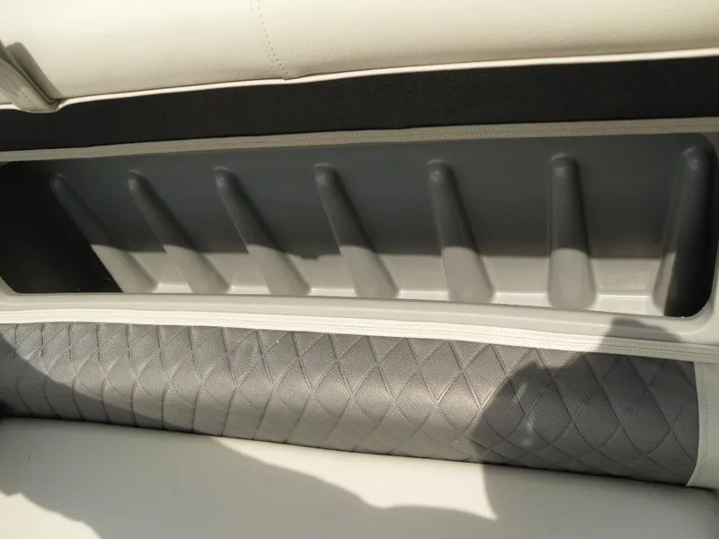 Slide: The Image of 2023 Sun Tracker Sportfish™ 24 XP3 interior storage compartment with quilted upholstery. - 37