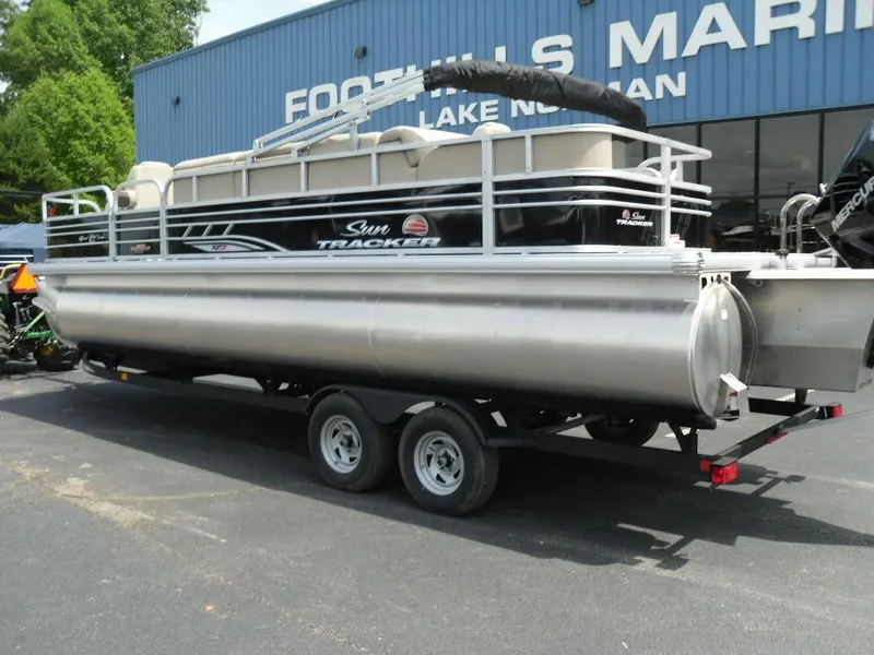 Slide: The Image of 2023 Sun Tracker Sportfish™ 24 XP3 pontoon boat on trailer at Foothills Marine. - 4
