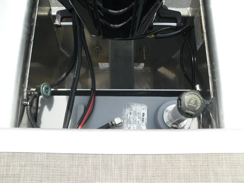 Slide: The Image of 2023 Sun Tracker Sportfish™ 24 XP3 engine compartment with visible wiring and components. - 41