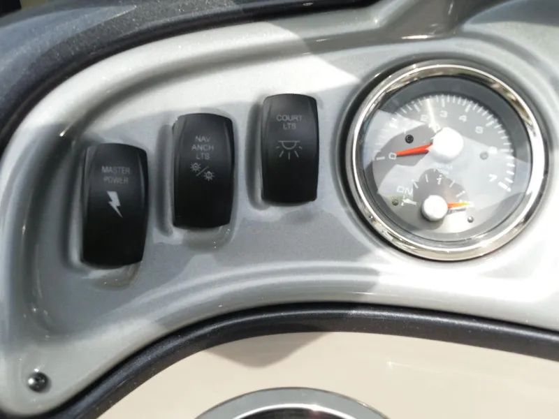 Slide: The Image of Dashboard controls of 2023 Sun Tracker Sportfish™ 24 XP3 boat. - 43