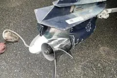 Slide: The Image of Propeller of a 2000 Javelin 20 Renegade boat on a wet surface. - 12