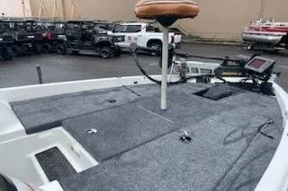 Slide: The Image of 2000 Javelin 20 Renegade boat deck with seating and control panel. - 17