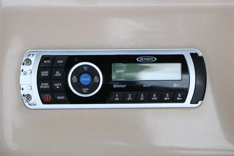 Slide: The Image of Jensen audio system on 2017 Sun Tracker Fishing Barge 20 DLX, featuring Bluetooth connectivity. - 27