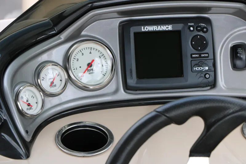 Slide: The Image of Dashboard of 2017 Sun Tracker Fishing Barge 20 DLX with gauges and Lowrance display. - 28