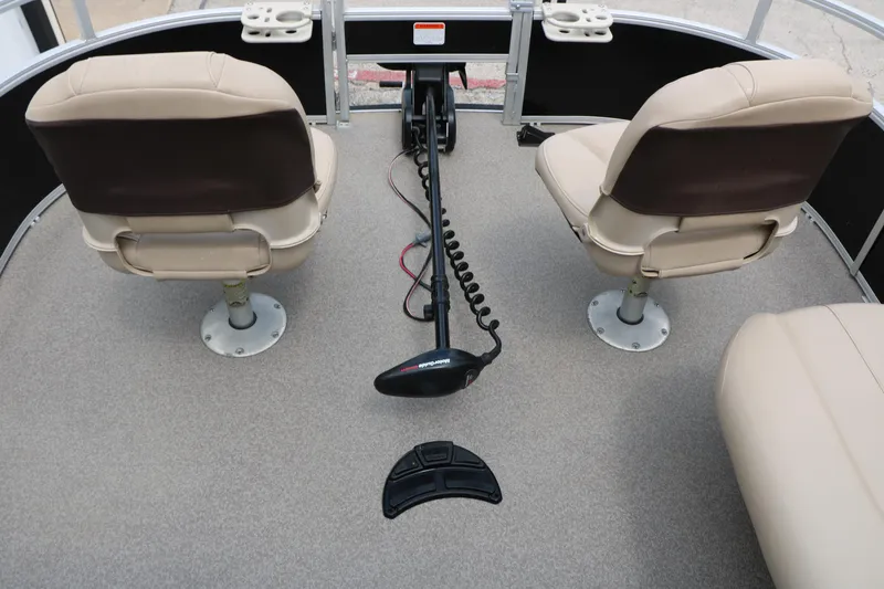 Slide: The Image of 2017 Sun Tracker Fishing Barge 20 DLX interior with swivel seats and trolling motor. - 30