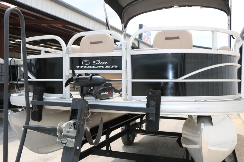 Slide: The Image of 2017 Sun Tracker Fishing Barge 20 DLX pontoon boat on trailer. - 6