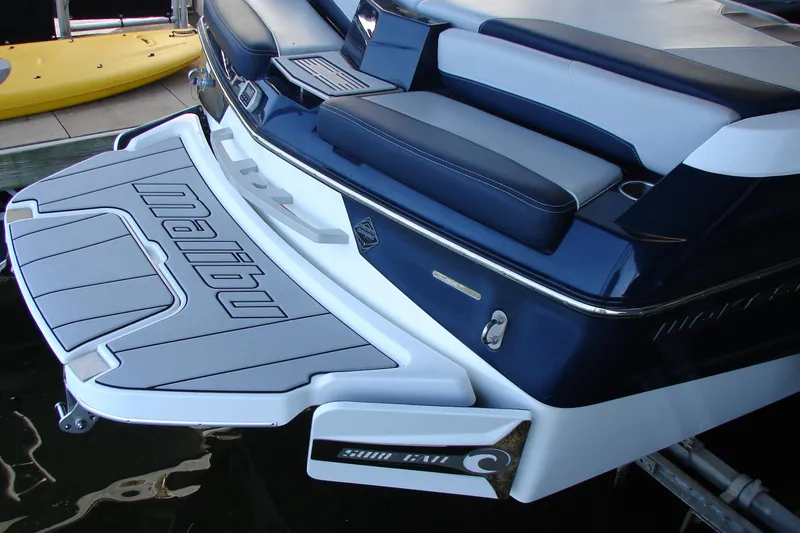 Slide: The Image of 2021 Malibu Wakesetter 22 LSV boat with sleek seating and swim platform. - 23