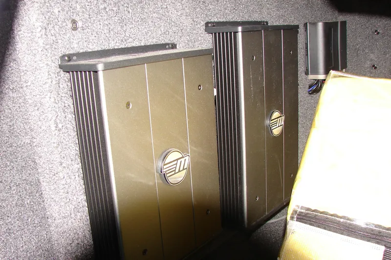 Slide: The Image of Audio amplifiers installed in a 2021 Malibu Wakesetter 22 LSV boat. - 30