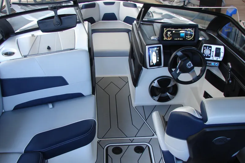 Slide: The Image of Interior of 2021 Malibu Wakesetter 22 LSV boat with modern dashboard and seating. - 44