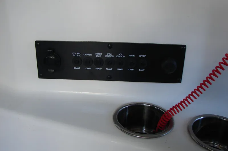 Slide: The Image of Control panel of 2021 Malibu Wakesetter 22 LSV with red coiled cord. - 45