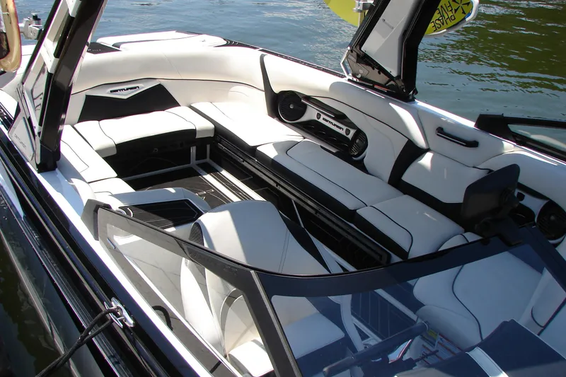 Slide: The Image of 2019 Centurion Ri257 boat interior with luxurious seating and modern design on the water. - 18