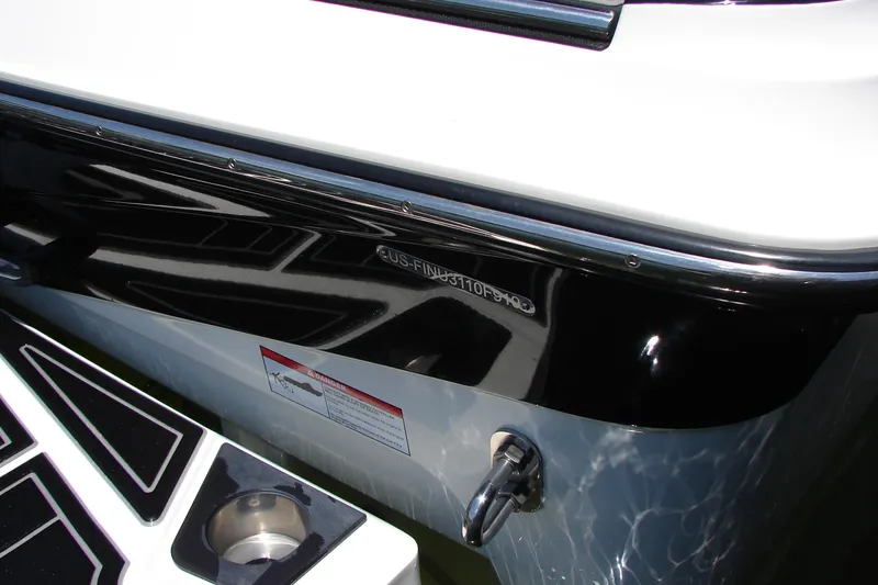 Slide: The Image of 2019 Centurion Ri257 boat detail with black and white exterior and chrome fittings. - 22