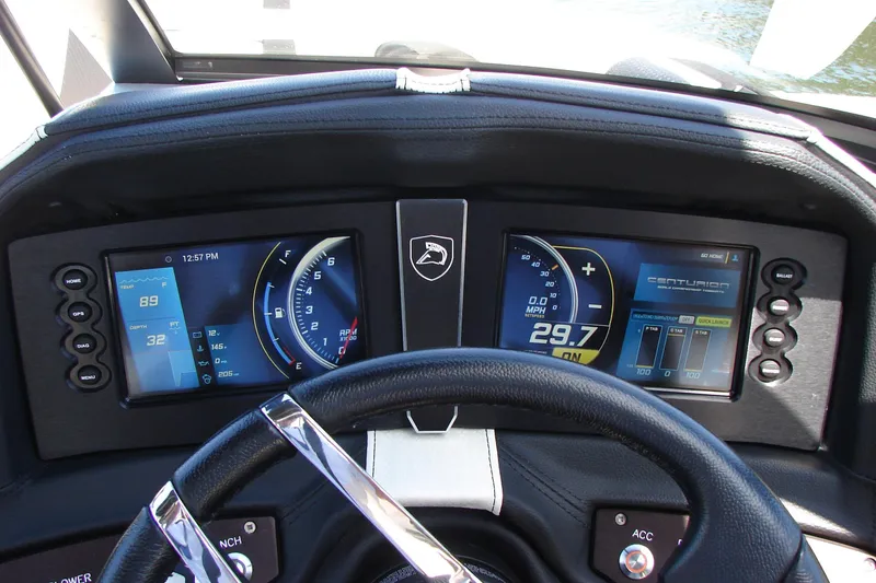Slide: The Image of Dashboard of a 2019 Centurion Ri257 boat with digital displays and controls. - 26