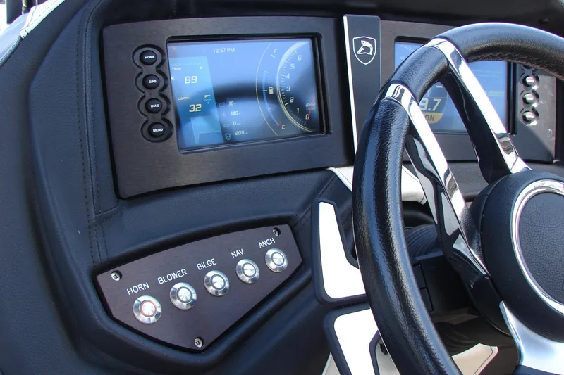 Slide: The Image of 2019 Centurion Ri257 dashboard with digital displays and control buttons. - 27