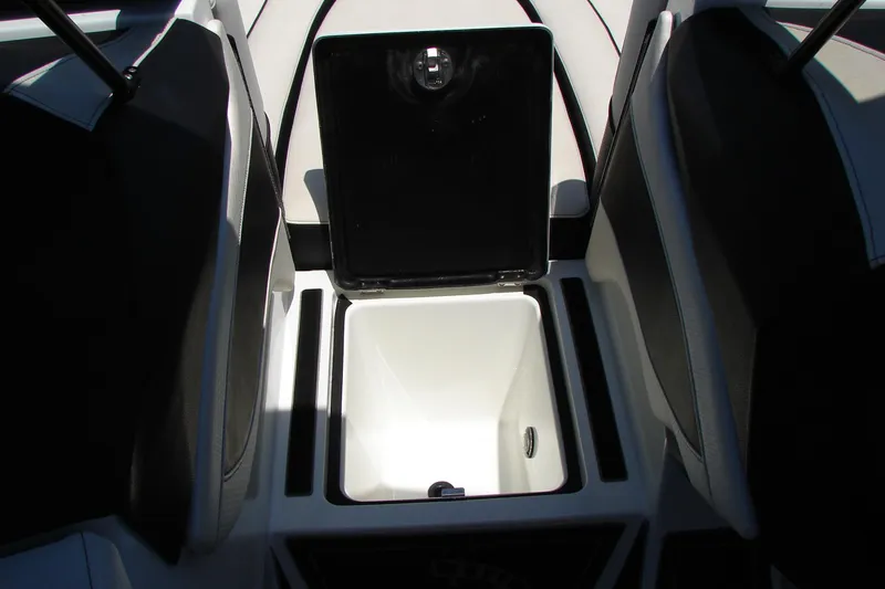 Slide: The Image of 2019 Centurion Ri257 boat interior storage compartment open. - 32